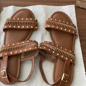 Brown and gold sandals